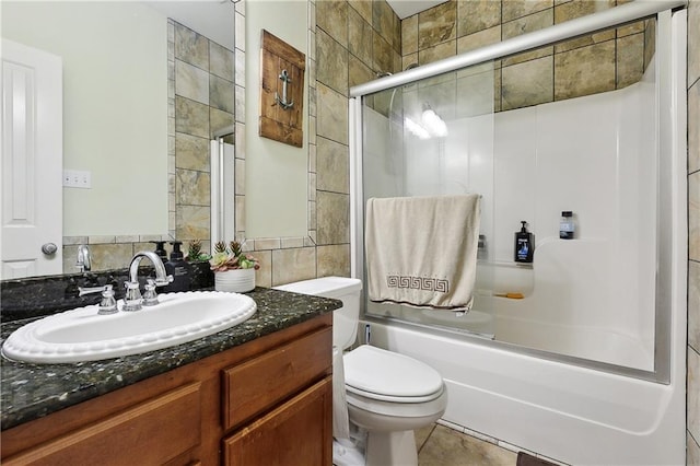 5 Rhonda Ct, Covington, LA 70433 - full bath featuring toilet, shower / bath combination with glass door, vanity, and tile patterned floors