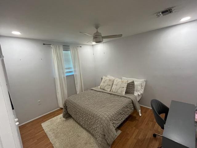 6133 Carlisle Ct, New Orleans, LA 70131 - bedroom with wood finished floors, a ceiling fan, baseboards, and recessed lighting
