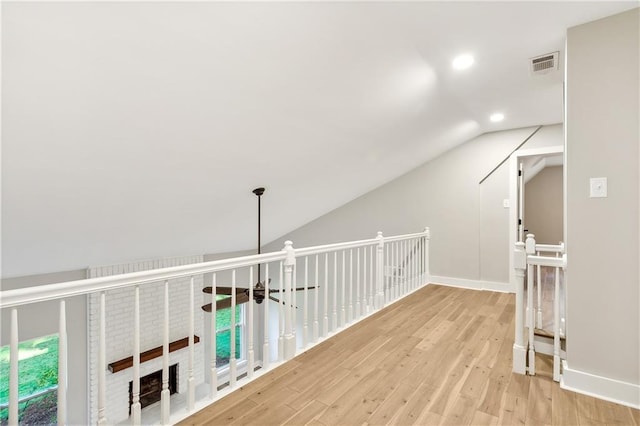 34 Glen Loop, Covington, LA 70435 - corridor with vaulted ceiling, wood finished floors, and recessed lighting