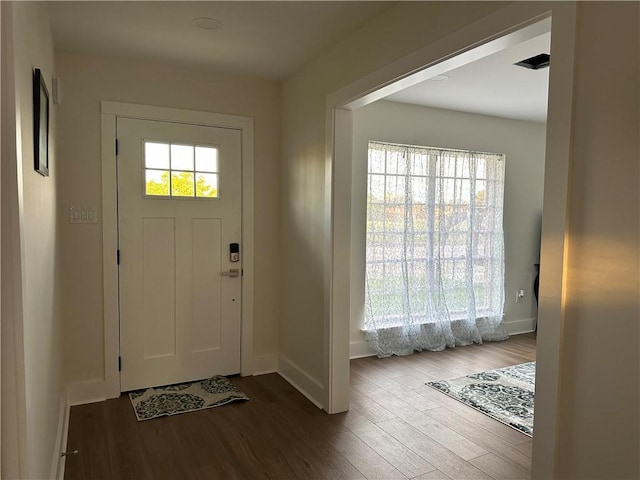 839 Behrman Ave, New Orleans, LA 70114 - entrance foyer featuring wood finished floors and baseboards