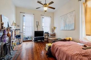 1700 S Rampart St, New Orleans, LA 70113 - bedroom featuring wood finished floors