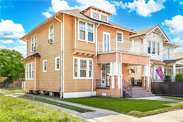 2315 Peniston St, New Orleans, LA 70115 - view of front of home with a porch, a balcony, cooling unit, and a shingled roof