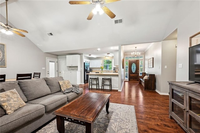 20035 River Parc Dr, Covington, LA 70433 - living area with a ceiling fan, dark wood-style floors, a chandelier, high vaulted ceiling, and baseboards