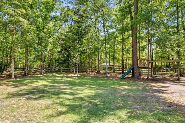 20035 River Parc Dr, Covington, LA 70433 - view of grassy yard featuring a playground