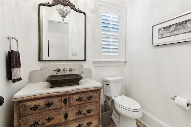474 Trailhead Dr, Abita Springs, LA 70420 - half bath with toilet, baseboards, and vanity