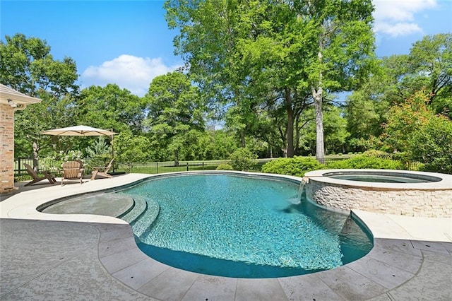 474 Trailhead Dr, Abita Springs, LA 70420 - view of swimming pool with a patio, view of wooded area, and a pool with connected hot tub