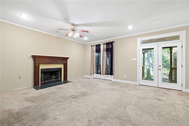 116 Fay Way, Slidell, LA 70460 - unfurnished living room featuring crown molding, a ceiling fan, carpet, a fireplace with flush hearth, and baseboards