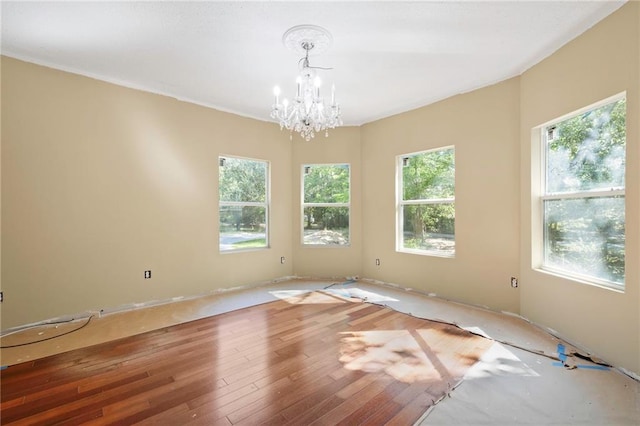 116 Fay Way, Slidell, LA 70460 - spare room with a chandelier and wood-type flooring