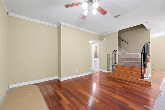 116 Fay Way, Slidell, LA 70460 - unfurnished living room featuring wood-type flooring, ceiling fan, stairs, ornamental molding, and baseboards