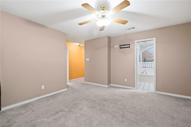 116 Fay Way, Slidell, LA 70460 - unfurnished room with carpet flooring, a ceiling fan, baseboards, and a textured ceiling