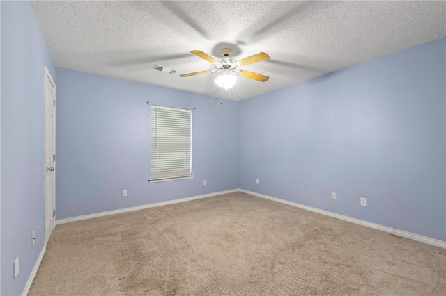 116 Fay Way, Slidell, LA 70460 - carpeted spare room featuring a ceiling fan, baseboards, and a textured ceiling