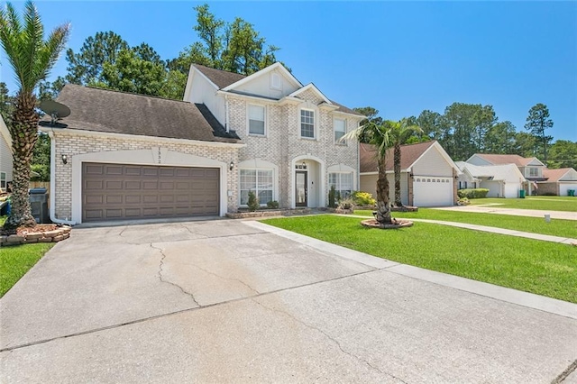 1332 Denmark Ct, Slidell, LA 70461 - view of front of property featuring a front lawn, concrete driveway, an attached garage, and brick siding