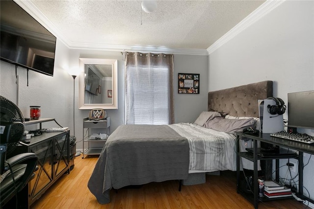 1332 Denmark Ct, Slidell, LA 70461 - bedroom featuring light wood-style floors, ornamental molding, and a textured ceiling
