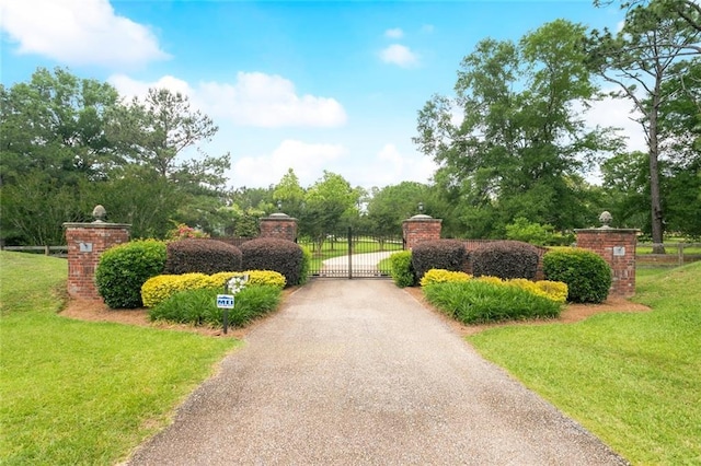 1203 W Cherry Hill Loop, Folsom, LA 70437 - community / neighborhood sign with a gate and view of scattered trees
