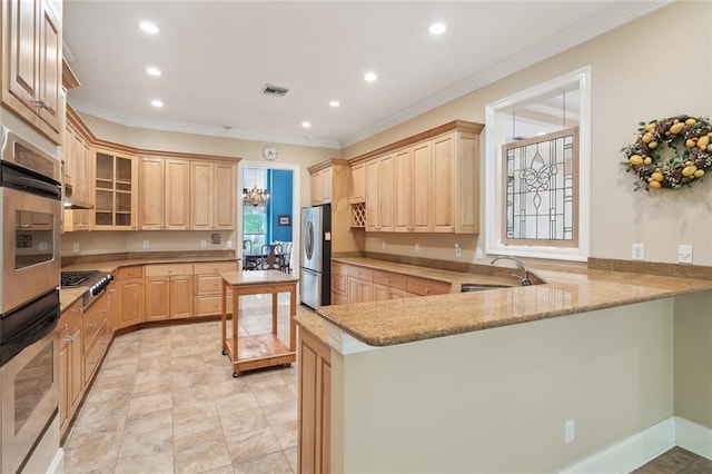 1203 W Cherry Hill Loop, Folsom, LA 70437 - kitchen featuring light brown cabinets, appliances with stainless steel finishes, a sink, recessed lighting, and a peninsula