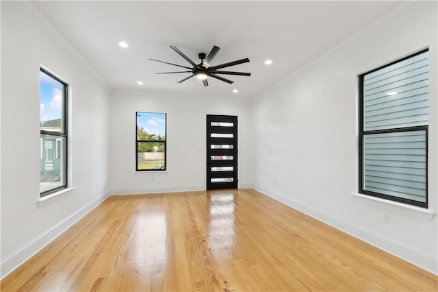 172224 St Ann St, New Orleans, LA 70116 - empty room with crown molding, light wood-style floors, a ceiling fan, recessed lighting, and baseboards