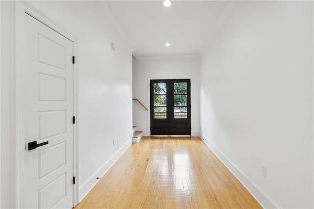 172224 St Ann St, New Orleans, LA 70116 - entrance foyer featuring crown molding, light wood-style floors, baseboards, stairs, and recessed lighting