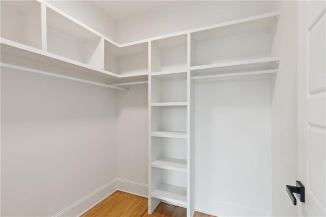 172224 St Ann St, New Orleans, LA 70116 - spacious closet featuring wood finished floors