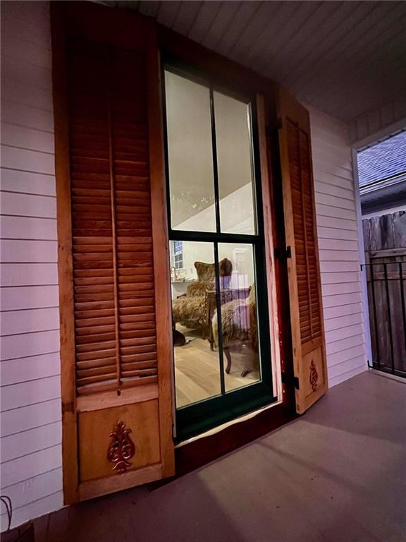 1819 Baronne St, New Orleans, LA 70113 - doorway with wooden walls