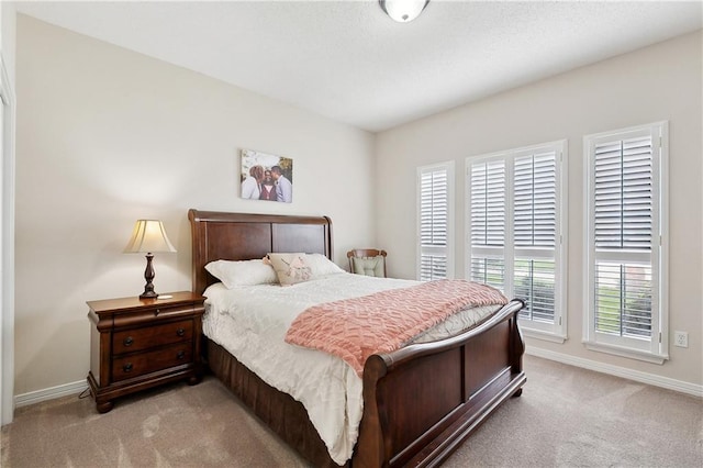 3 Lake Lynn Dr, Harvey, LA 70058 - bedroom featuring carpet flooring, multiple windows, and baseboards