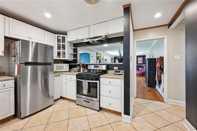 5139 Pratt Dr, New Orleans, LA 70122 - kitchen with stainless steel appliances, white cabinetry, glass insert cabinets, crown molding, and recessed lighting