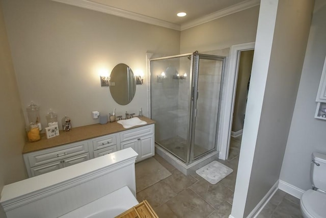 bathroom featuring crown molding, toilet, a stall shower, vanity, and baseboards