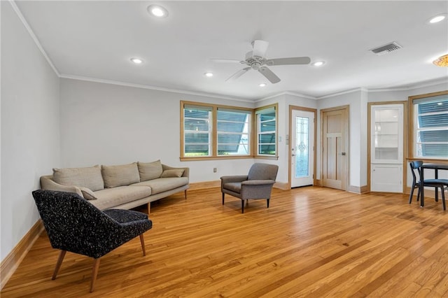 401 Riverdale Dr, Jefferson, LA 70121 - living area featuring ornamental molding, light wood finished floors, baseboards, recessed lighting, and a ceiling fan
