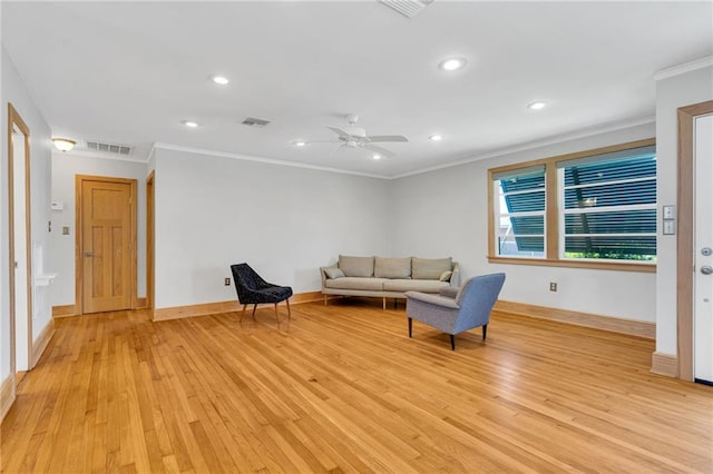 401 Riverdale Dr, Jefferson, LA 70121 - living area featuring light wood finished floors, recessed lighting, ornamental molding, baseboards, and a ceiling fan