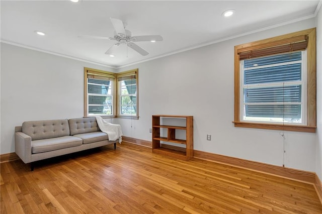 401 Riverdale Dr, Jefferson, LA 70121 - living area with recessed lighting, light wood finished floors, baseboards, ornamental molding, and a ceiling fan