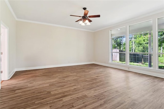 436 Nighthawk Dr, Slidell, LA 70461 - unfurnished room featuring healthy amount of natural light, a ceiling fan, crown molding, and wood finished floors