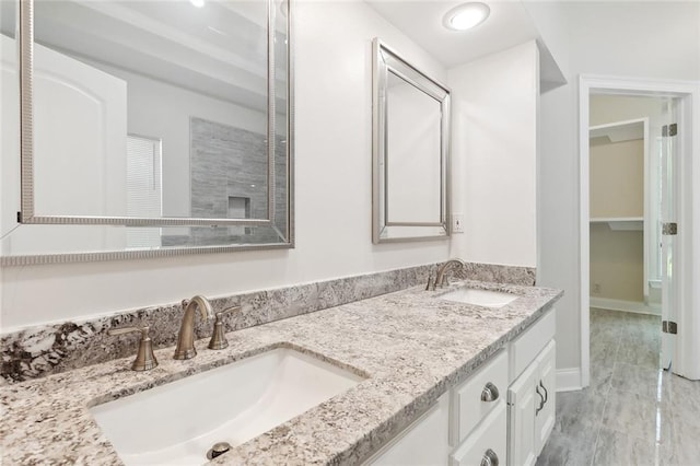 436 Nighthawk Dr, Slidell, LA 70461 - bathroom featuring double vanity and baseboards