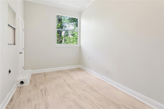 436 Nighthawk Dr, Slidell, LA 70461 - unfurnished room with crown molding, baseboards, and marble finish flooring