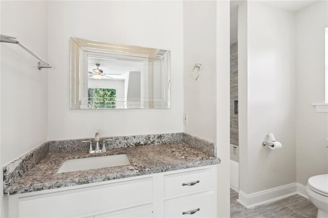 436 Nighthawk Dr, Slidell, LA 70461 - bathroom with toilet, a ceiling fan, and vanity