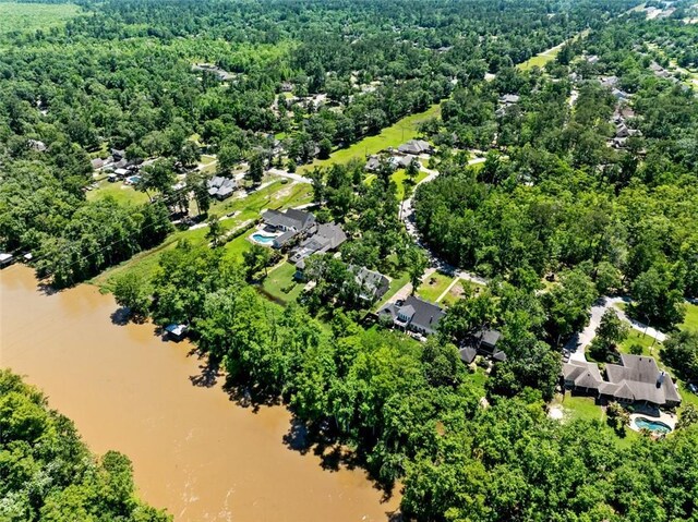 436 Nighthawk Dr, Slidell, LA 70461 - drone / aerial view of a nearby body of water and a heavily wooded area