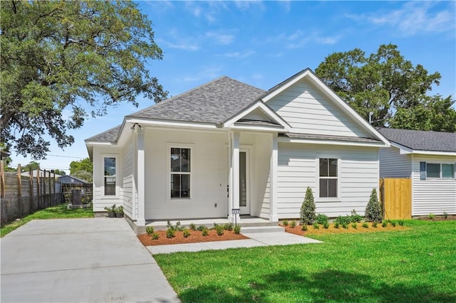 342 W Ave, Harahan, LA 70123 - view of front of house featuring roof with shingles and concrete driveway