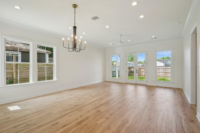 342 W Ave, Harahan, LA 70123 - empty room featuring plenty of natural light, a chandelier, recessed lighting, light wood-type flooring, and ornamental molding