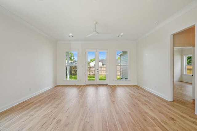 342 W Ave, Harahan, LA 70123 - unfurnished room with ornamental molding, a ceiling fan, baseboards, french doors, and light wood-style flooring