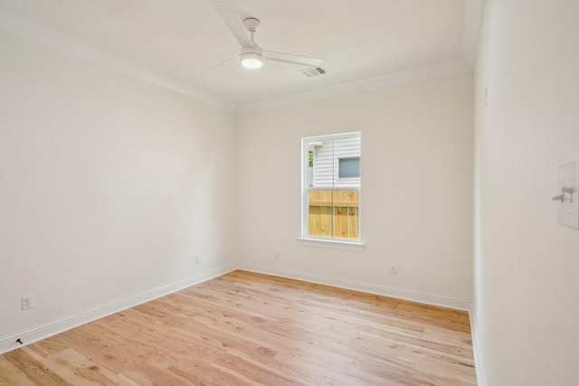 342 W Ave, Harahan, LA 70123 - unfurnished room with ceiling fan, light wood-style floors, baseboards, and crown molding