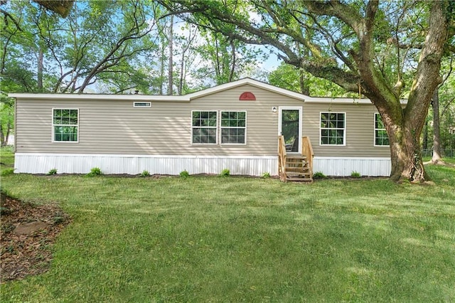 25512 W Spruce St, Lacombe, LA 70445 - manufactured / mobile home featuring entry steps and a front yard