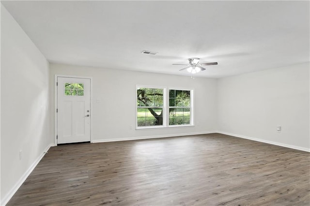 25512 W Spruce St, Lacombe, LA 70445 - foyer entrance with a ceiling fan, wood finished floors, and baseboards