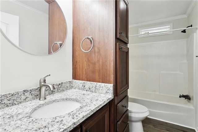 25512 W Spruce St, Lacombe, LA 70445 - full bath with crown molding, toilet, shower / bathtub combination, vanity, and wood finished floors