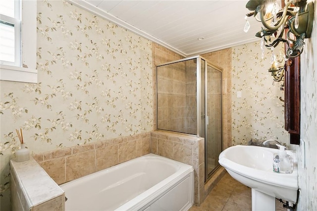 1612 Milan St, New Orleans, LA 70115 - bathroom featuring a shower stall, a garden tub, wallpapered walls, and crown molding
