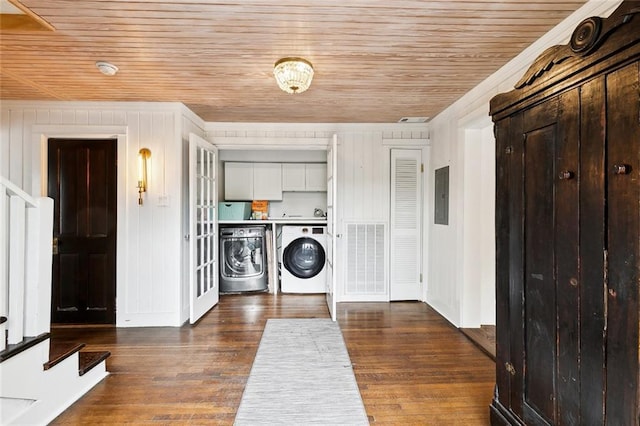 1612 Milan St, New Orleans, LA 70115 - laundry room with wood ceiling, cabinet space, electric panel, washer and clothes dryer, and dark wood-style floors