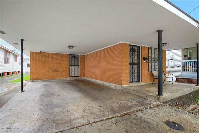 521 S Alexander St, New Orleans, LA 70119 - view of patio with a carport