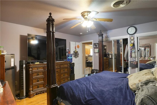 521 S Alexander St, New Orleans, LA 70119 - bedroom featuring light wood finished floors and ceiling fan