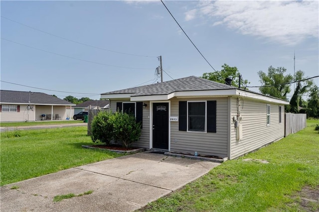 2603 Huey P Long Ave, Gretna, LA 70053 - bungalow with a front lawn and a shingled roof