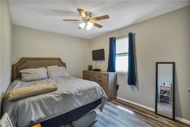 2603 Huey P Long Ave, Gretna, LA 70053 - bedroom with wood finished floors, baseboards, and ceiling fan