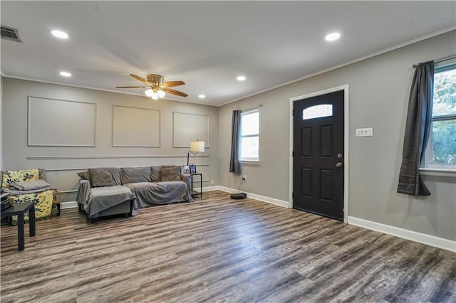2603 Huey P Long Ave, Gretna, LA 70053 - living area with crown molding, plenty of natural light, wood finished floors, recessed lighting, and ceiling fan