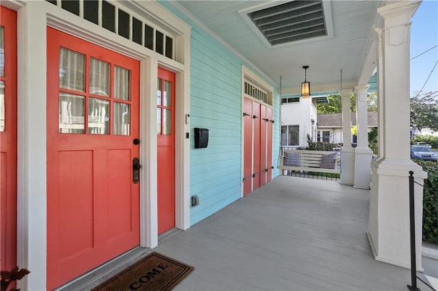 7715 Panola St, New Orleans, LA 70118 - entrance to property featuring covered porch