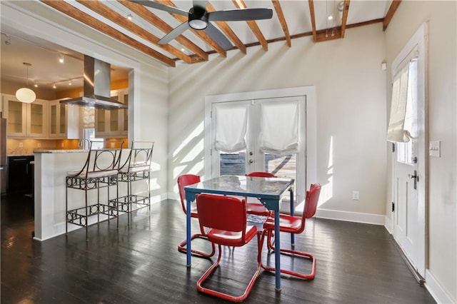 7715 Panola St, New Orleans, LA 70118 - dining space featuring plenty of natural light, a ceiling fan, baseboards, and beamed ceiling